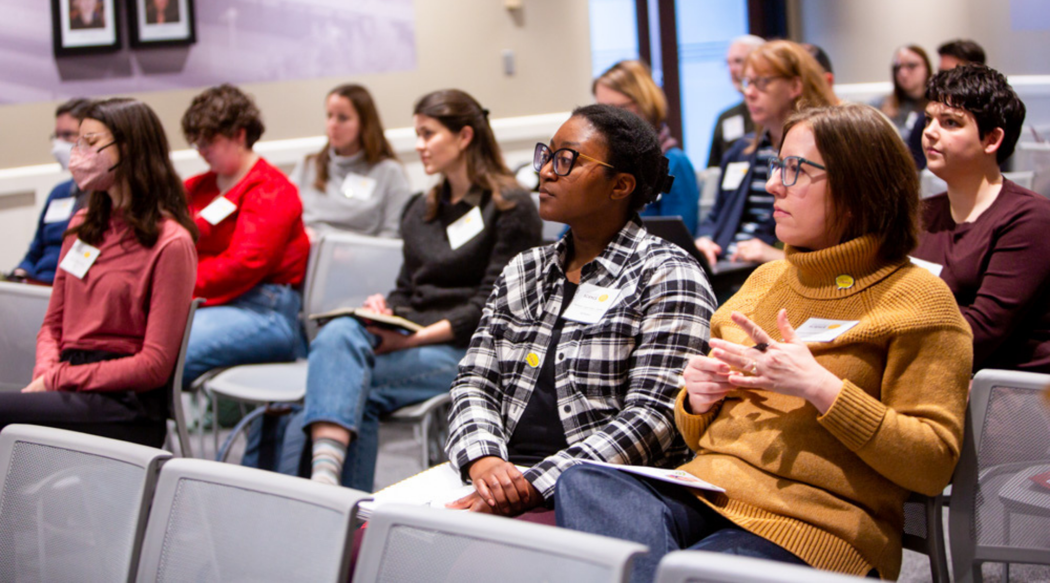 Speaking Science attendees seated at a presentation.